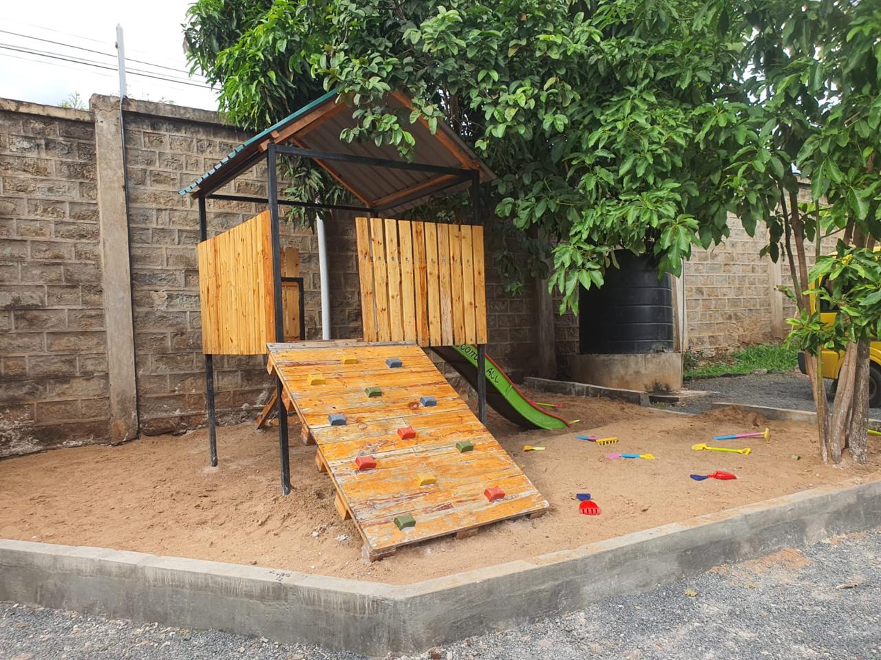 Children's wooden climbing frame and adventure playground